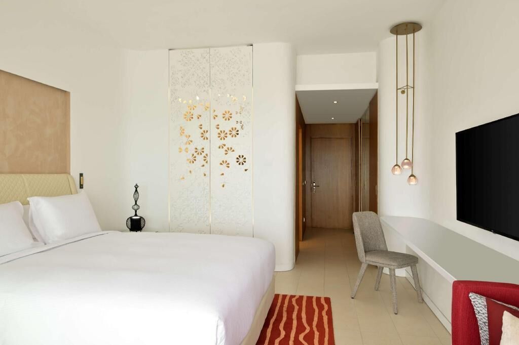 In-room safe, laptop workspace, blackout curtains, iron/ironing board