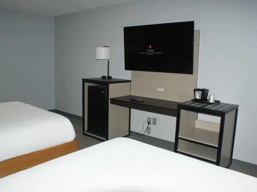 Pillow-top beds, desk, laptop workspace, blackout curtains