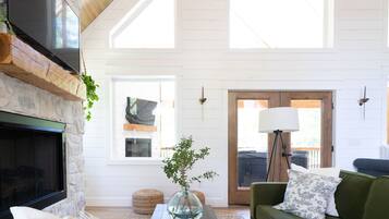 Smart TV, fireplace, books