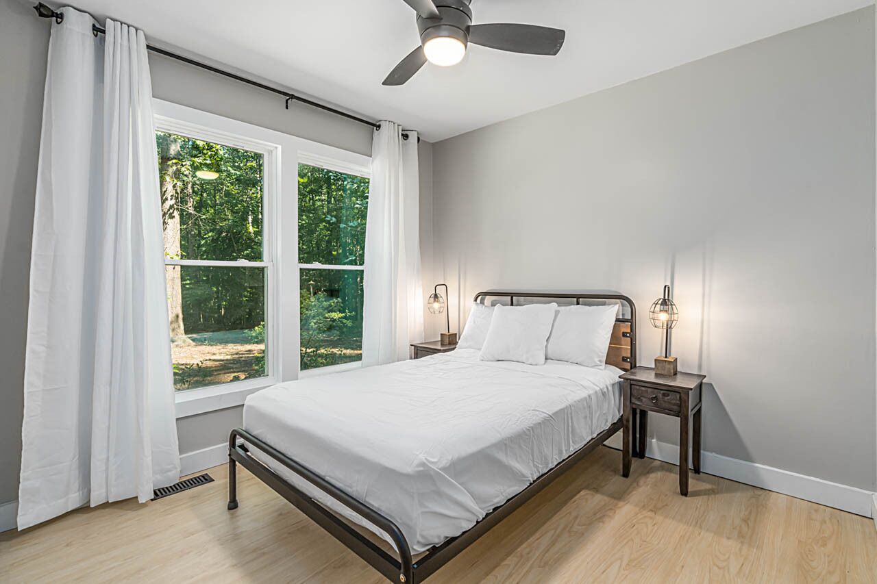 Retreat to your own Refuge w/towering pines & oaks w/firepit close to everything