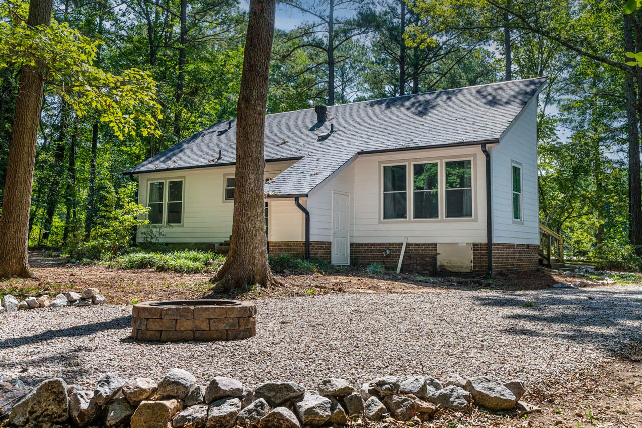 Retreat to your own Refuge w/towering pines & oaks w/firepit close to everything