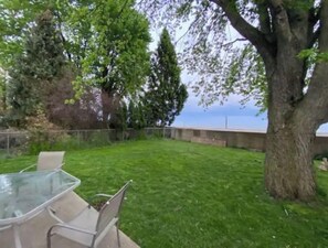 Terrace/patio - Peaceful Lakefront Living – 3-BR Home with Breathtaking Views; Pet & Smoke-Free (Charter Township of Berlin)