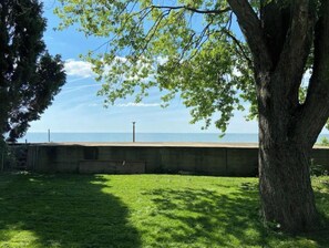 Property grounds - Peaceful Lakefront Living – 3-BR Home with Breathtaking Views; Pet & Smoke-Free (Charter Township of Berlin)