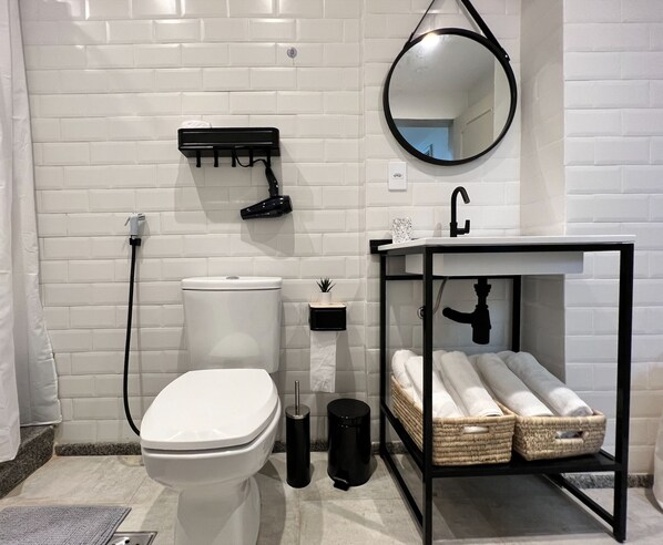 Shower, hair dryer, towels, soap