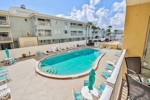 A heated pool, pool loungers