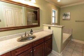 Combined shower/tub, hair dryer, towels, soap