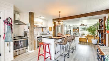 Fridge, stovetop, dishwasher, coffee/tea maker