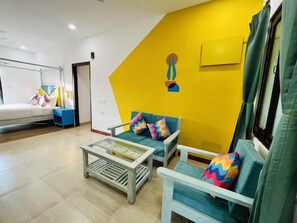 Deluxe Double AC Room With Ensuite Bathroom | Living area