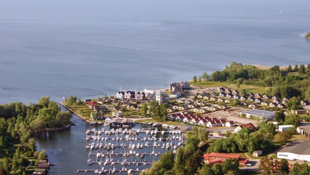 An aerial view of a coastal residential area with a marina filled with boats. - Amazing Home in Rechlin With 2 Bedrooms, Sauna and Wifi (Rechlin)