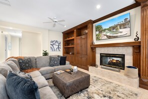 Televisio, takka, työhuone