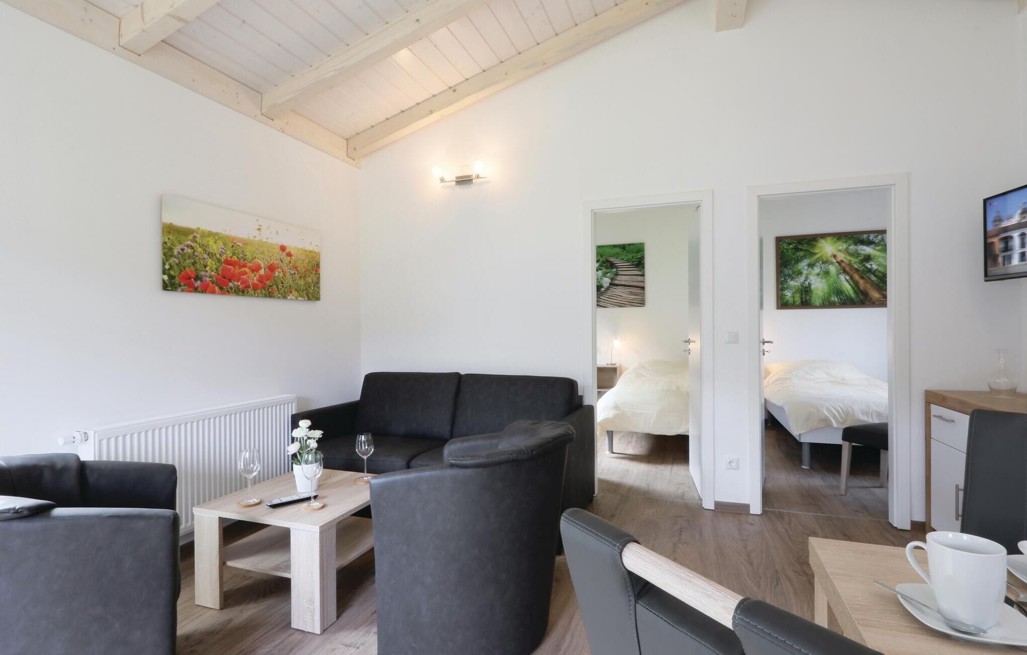 Ferienhaus (Ferienhausdorf Thale) | Wohnzimmer | Fernseher