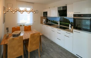 Apartment | Private kitchen | Fridge, cookware/dishes/utensils