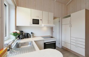 Casa (Morgensonne 6 - Dorf 2) | Cozinha privada | Geladeira, talheres/pratos/utensílios de cozinha