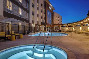 Outdoor pool, open 7:00 AM to 10:00 PM, pool umbrellas, sun loungers