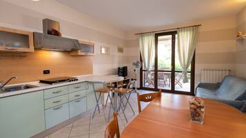 Apartment | Living area | 60-inch TV with digital channels