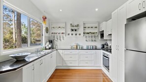 Fridge, microwave, oven, stovetop - Kinnera Cottage - walk to the beach (MOSSY POINT)