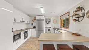Fridge, microwave, oven, stovetop - Mum's Beach House by Experience Jervis Bay (Vincentia)