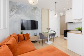 Apartamento, 2 quartos, sacada | Área de estar