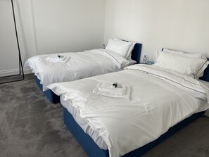 Departamento | 2 habitaciones, tabla de planchar con plancha y wifi gratis 