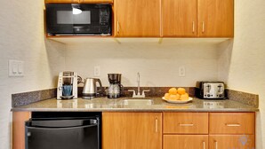 Coffee/tea maker, microwave, toaster, cookware/dishes/utensils