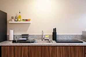 Fridge, microwave, stovetop, coffee/tea maker