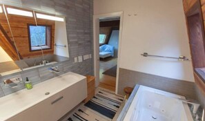 Bathtub, hair dryer, shampoo