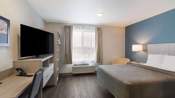 Individually furnished, desk, laptop workspace, blackout drapes