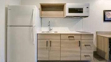 Desk, laptop workspace, blackout curtains, iron/ironing board