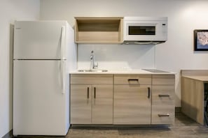 Desk, laptop workspace, blackout curtains, iron/ironing board - WoodSpring Suites Knoxville West (Knoxville)