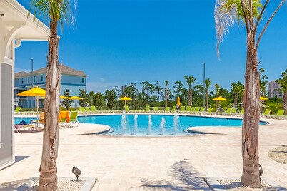 Beautiful & open home with enclosed porch, game room, W/D - beach & pool access