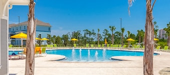 Beautiful & open home with enclosed porch, game room, W/D - beach & pool access