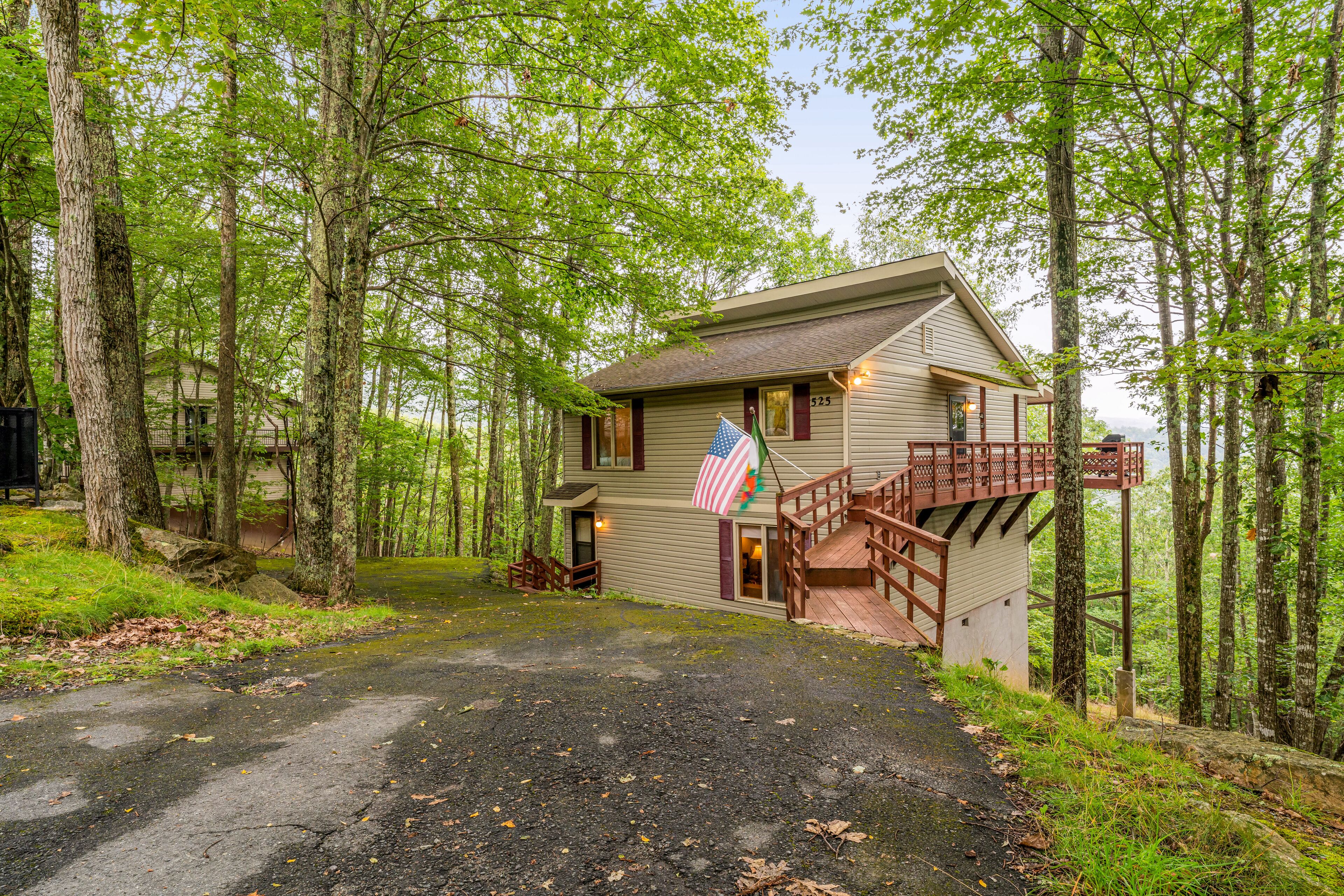 Private dog-friendly mountain home with foosball, gas grill & covered deck