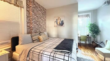 1 bedroom, desk, iron/ironing board, travel cot