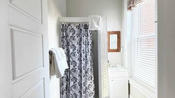 Shower, hair dryer, shampoo