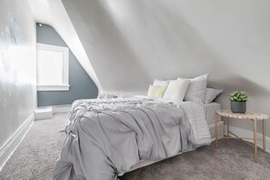 1 bedroom, desk, iron/ironing board, travel crib