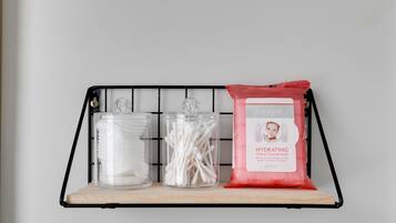 Shower, hair dryer, shampoo