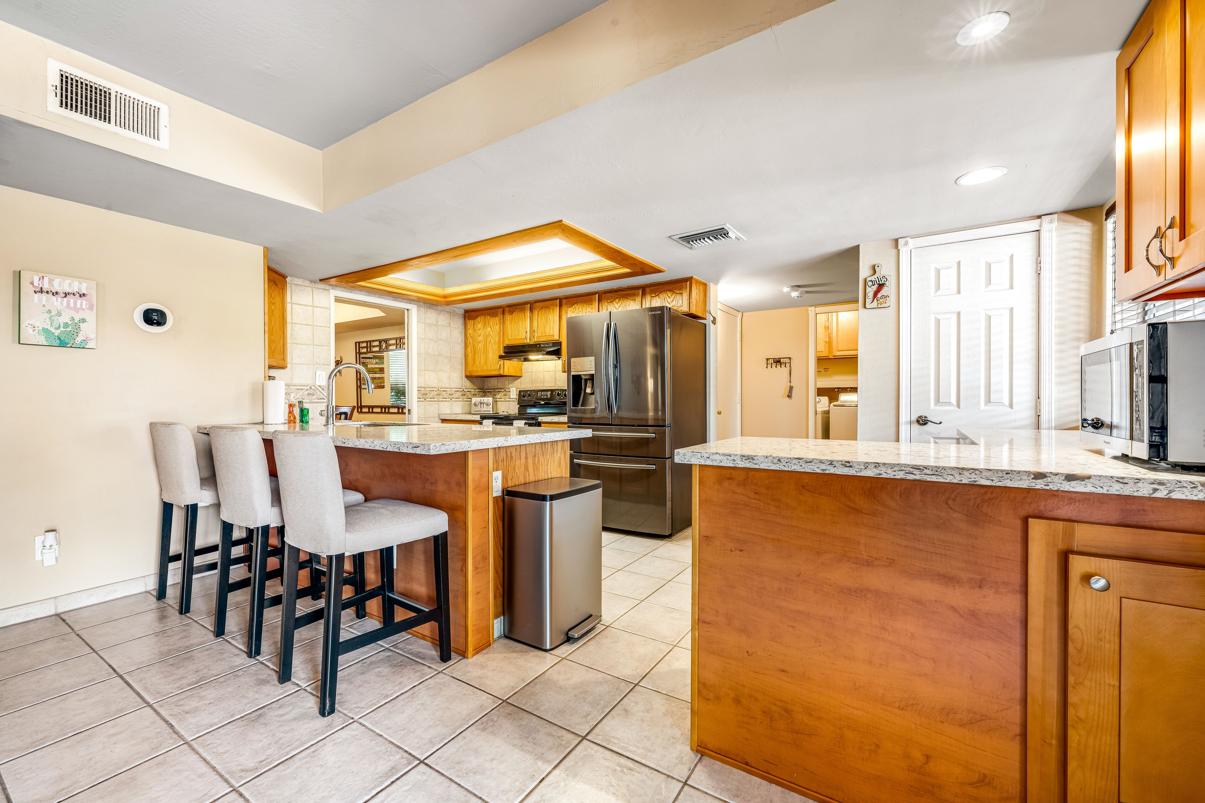 Quiet Scottsdale retreat with enclosed yard, pool, patio, grill, game room & W/D