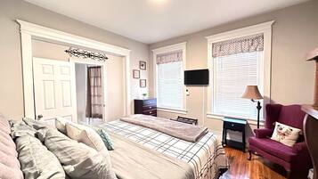 1 bedroom, desk, iron/ironing board, travel crib