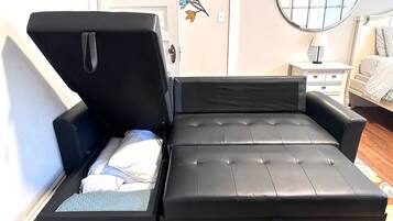 1 bedroom, desk, iron/ironing board, travel crib