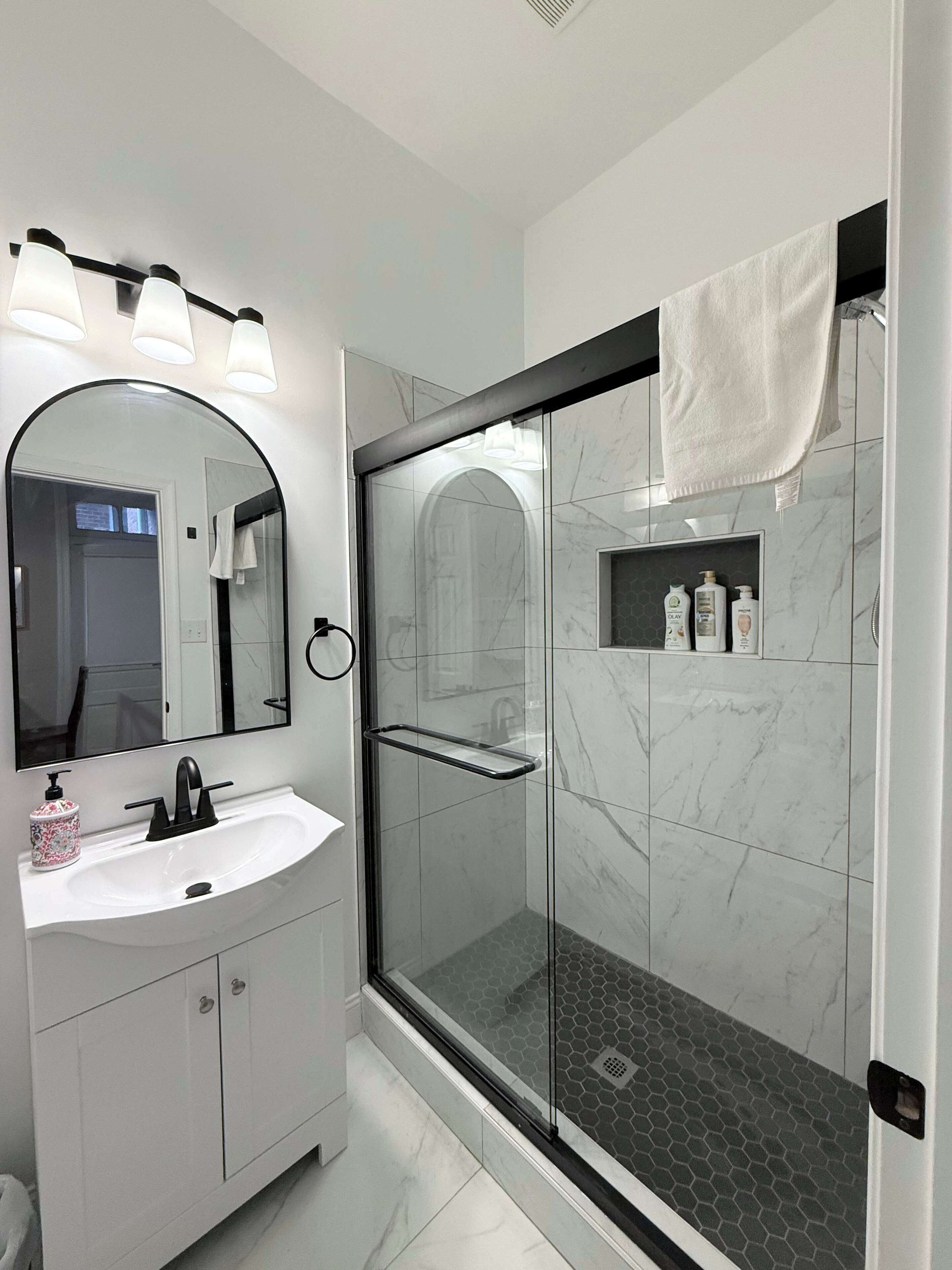 Shower, hair dryer, towels