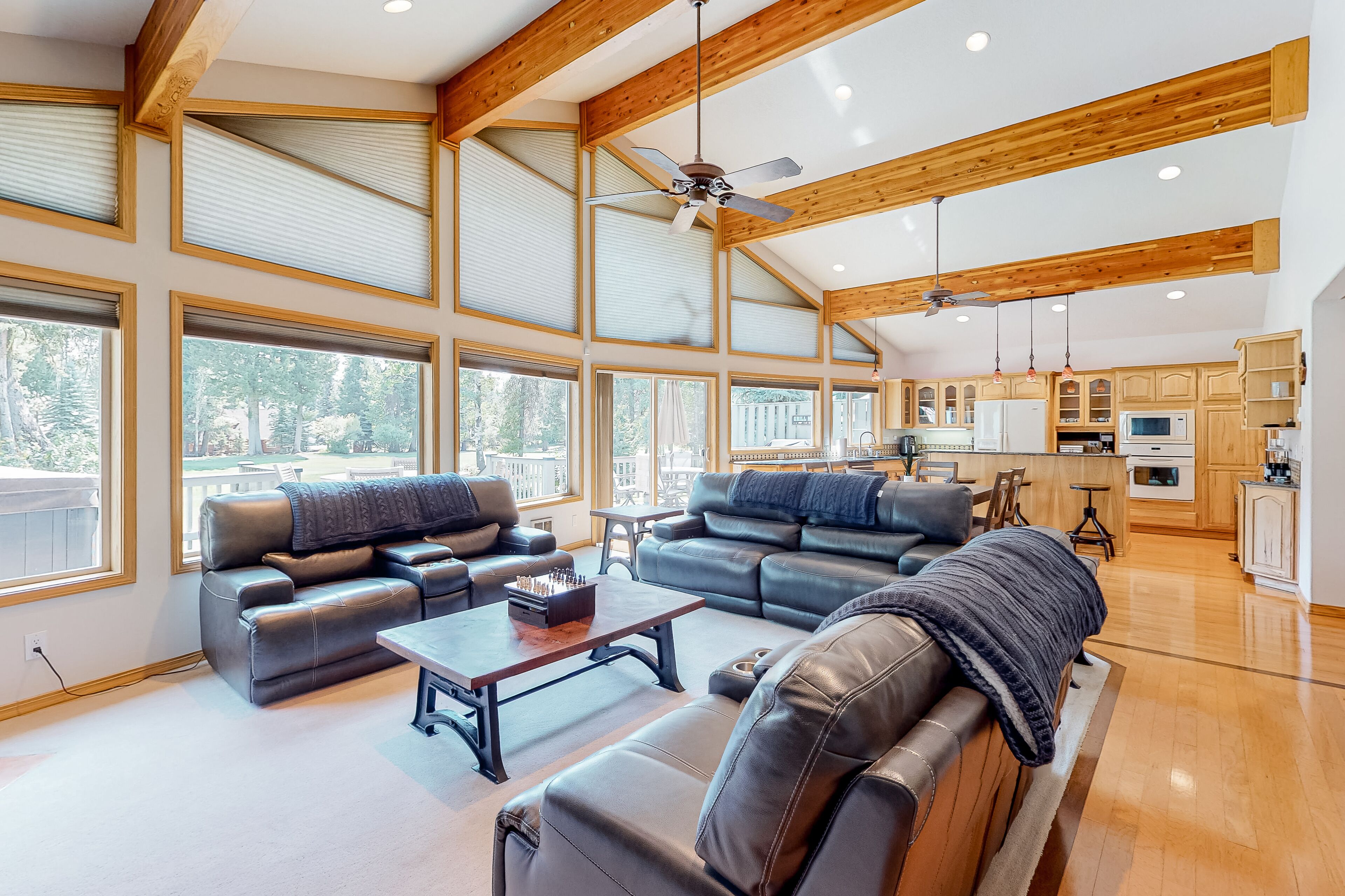 Spacious home with private hot tub, electric fireplace, & deck - on golf course