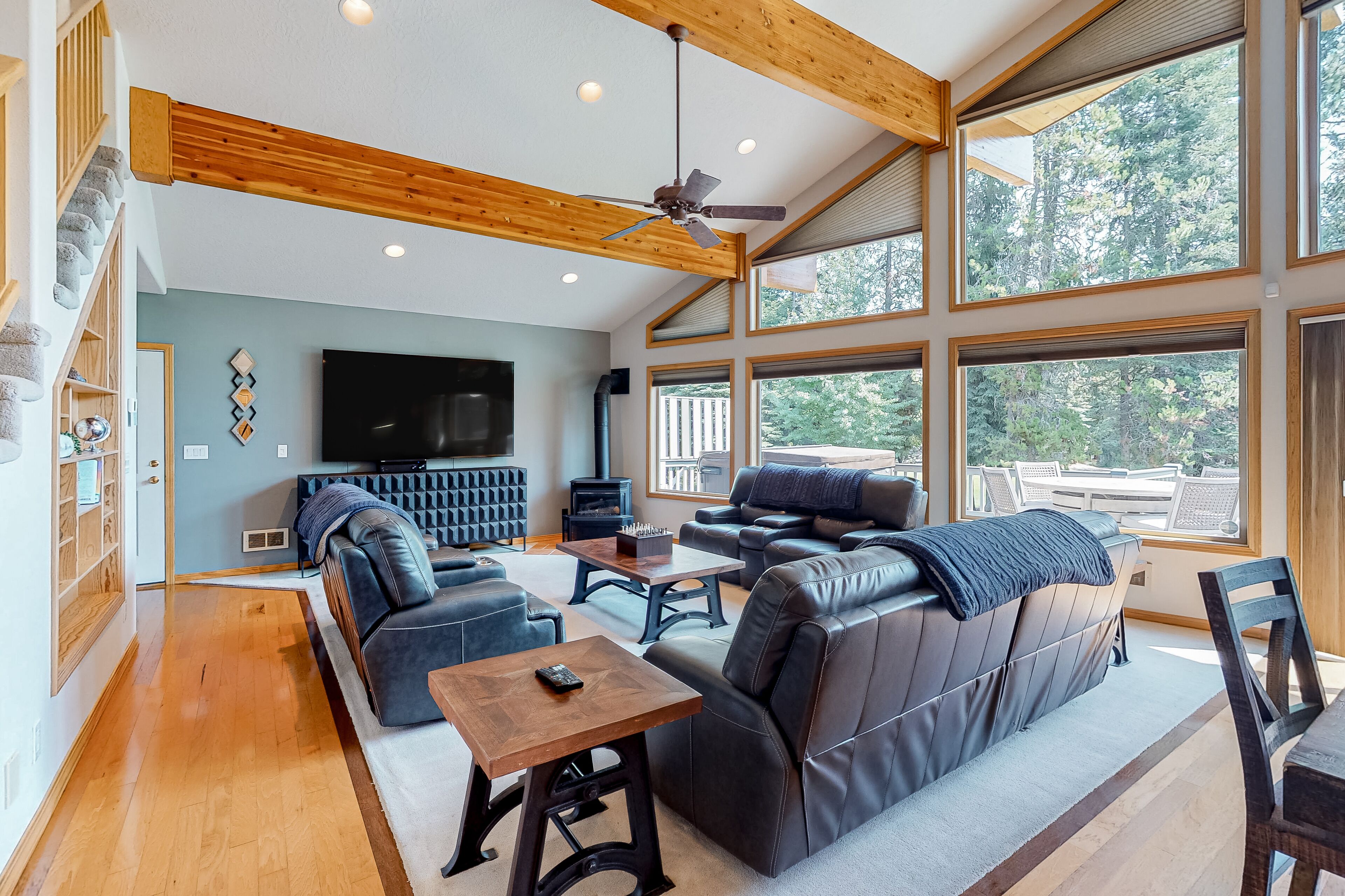 Spacious home with private hot tub, electric fireplace, & deck - on golf course