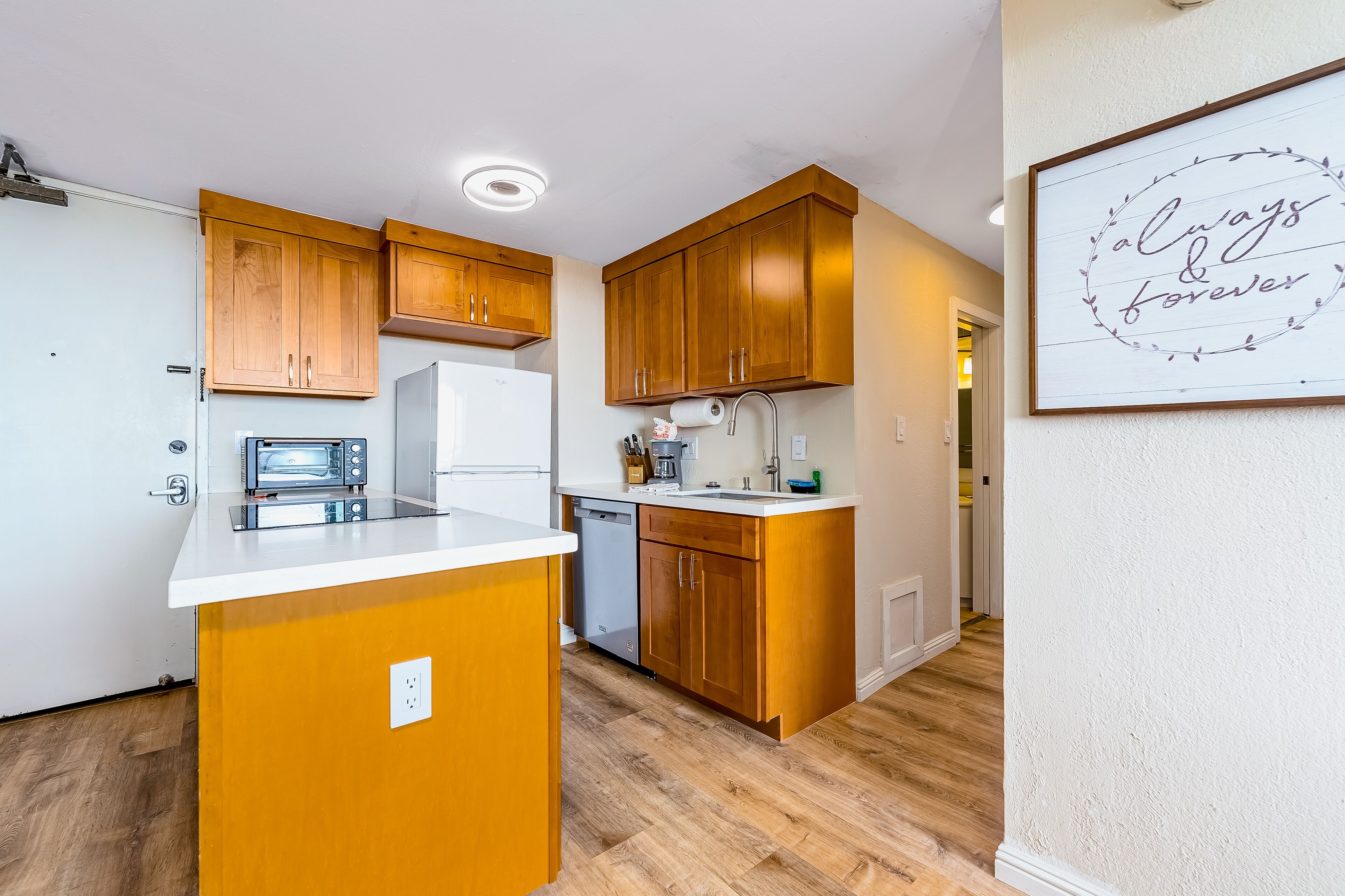 Central ocean-view condo with grill deck, pool, & hot tub - near beach