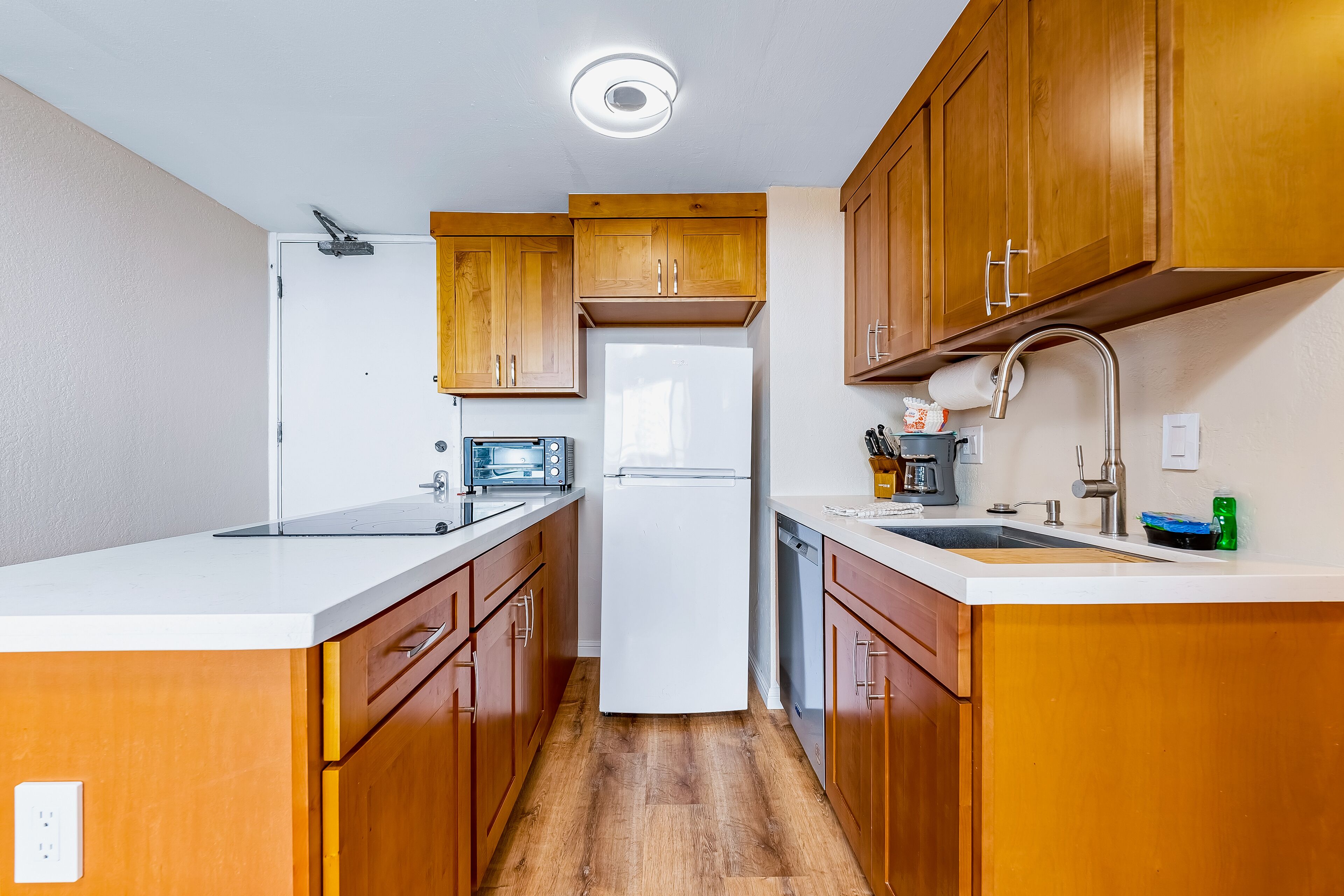 Central ocean-view condo with grill deck, pool, & hot tub - near beach