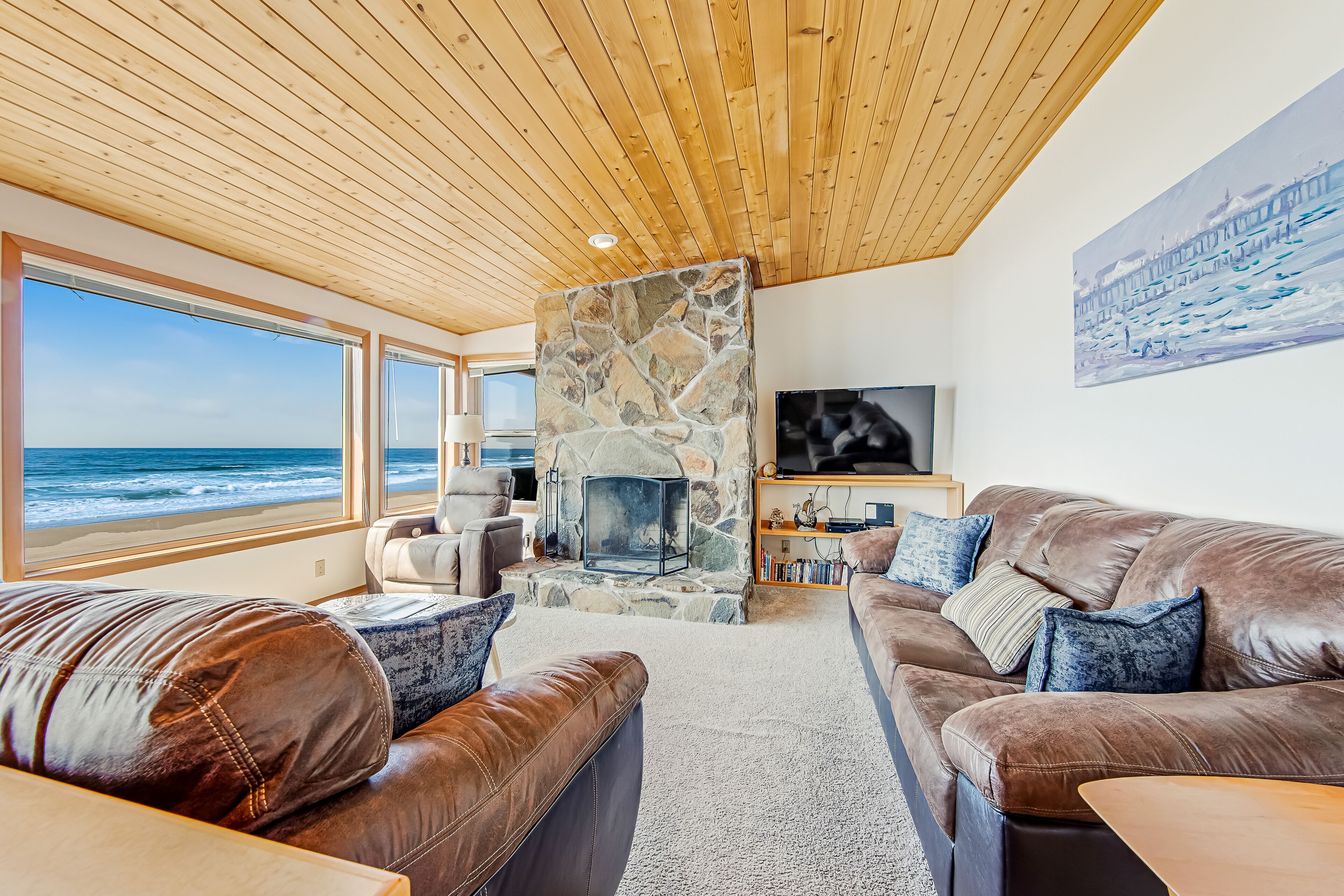 Two-story oceanfront retreat with a washer/dryer, firepit, & Ping-Pong table