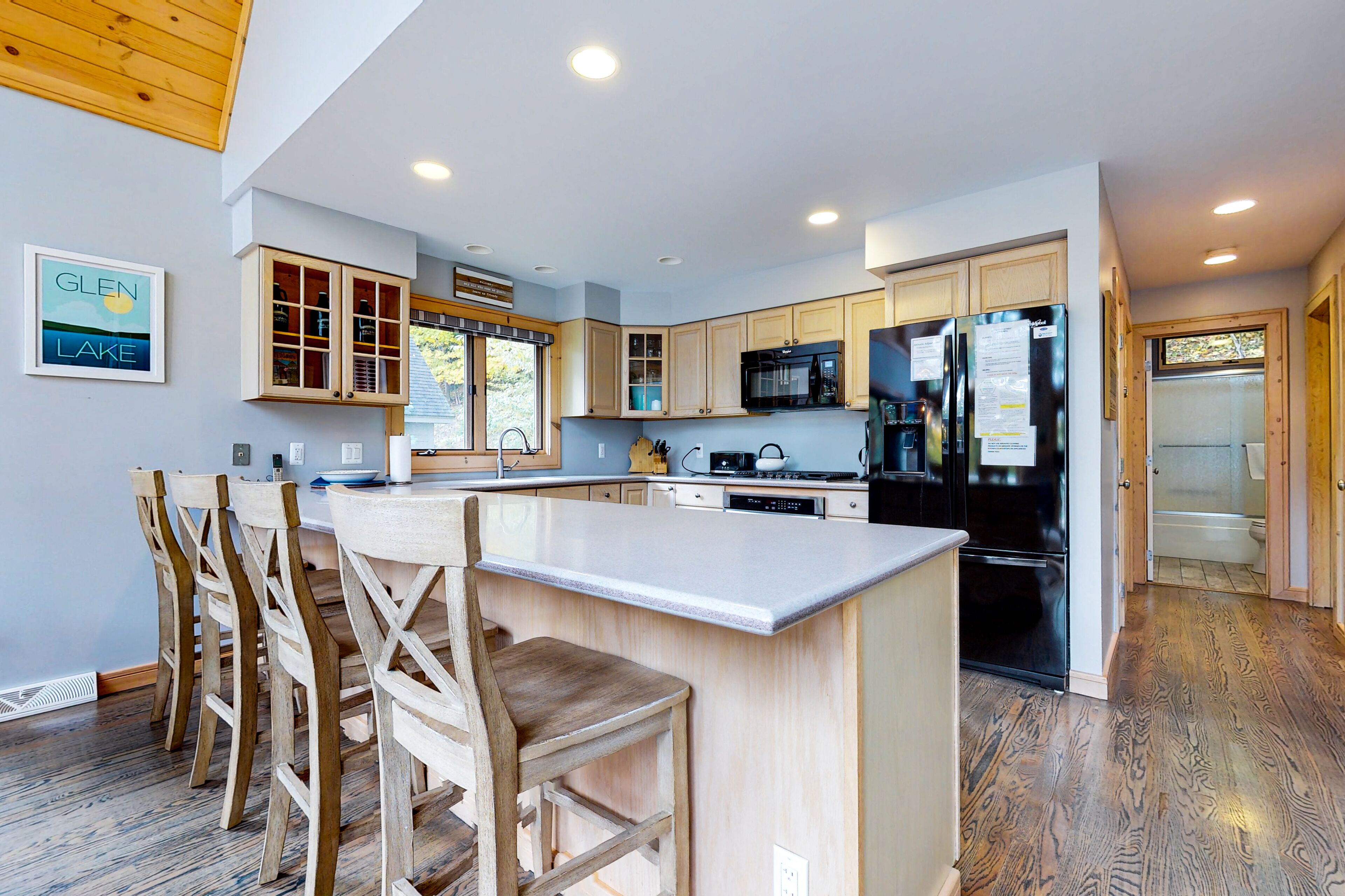 Spacious lakefront home with a fireplace, central AC, washer/dryer, grill