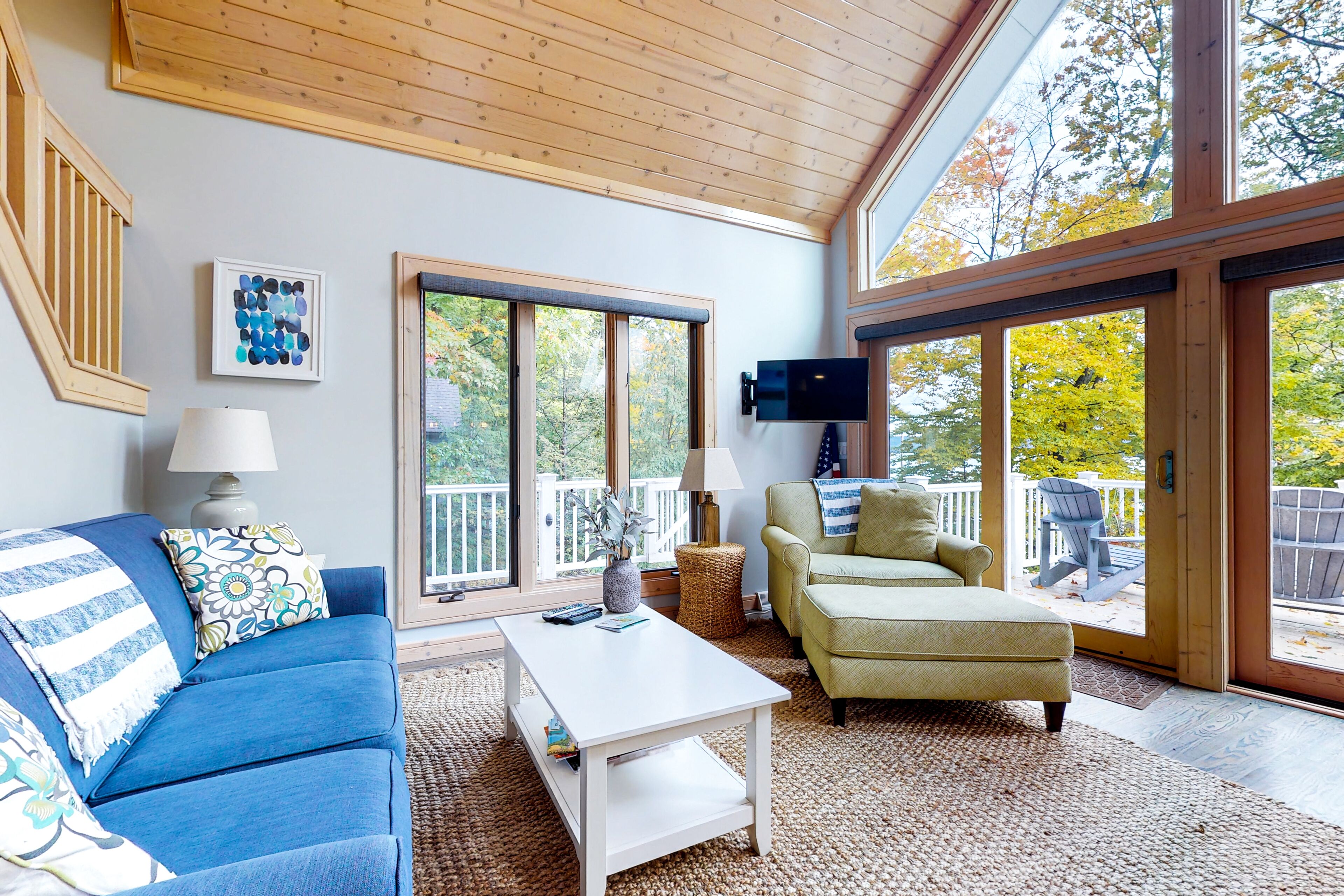 Spacious lakefront home with a fireplace, central AC, washer/dryer, grill