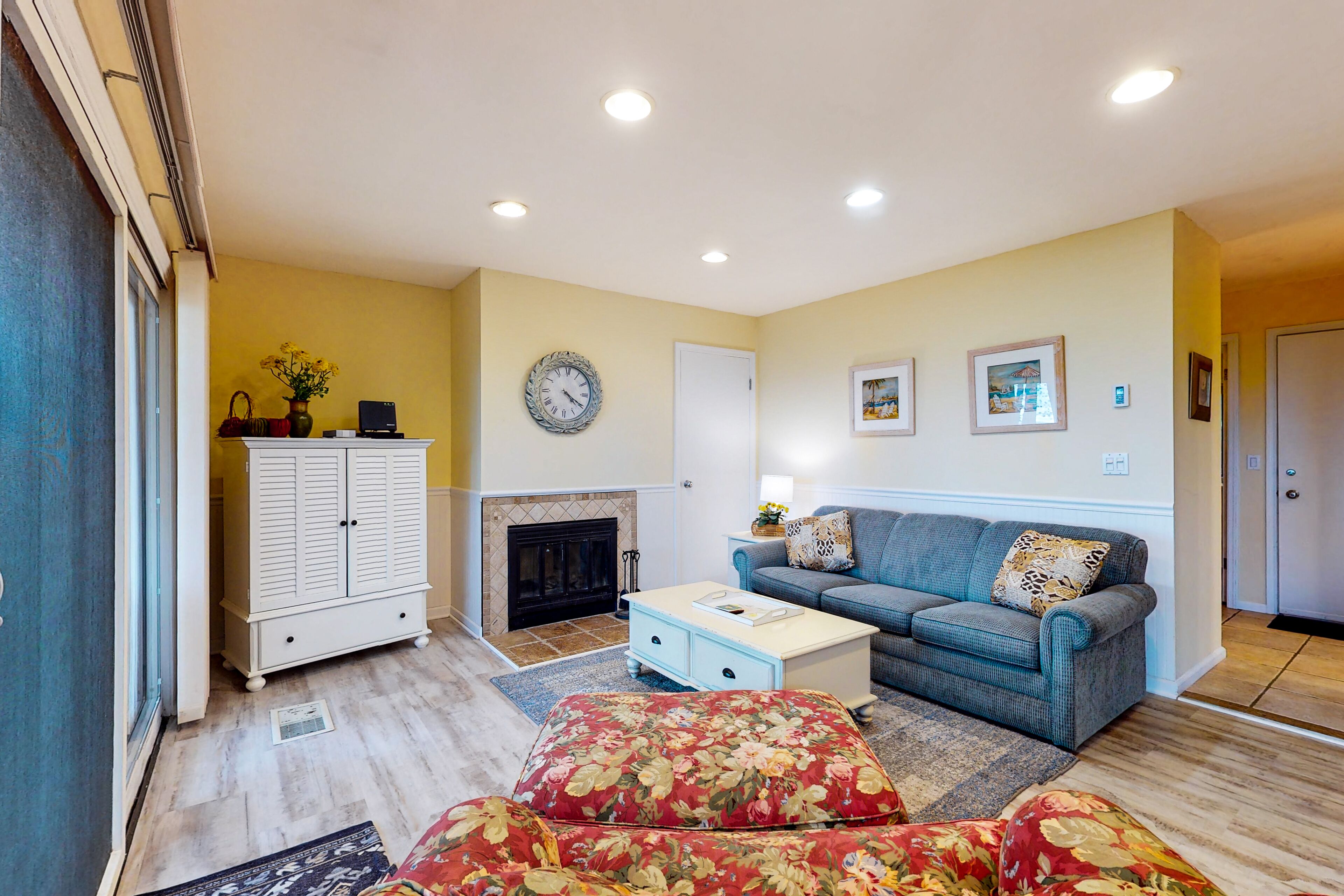 Riverfront condo with lake and river access, fireplace, firepit & gym