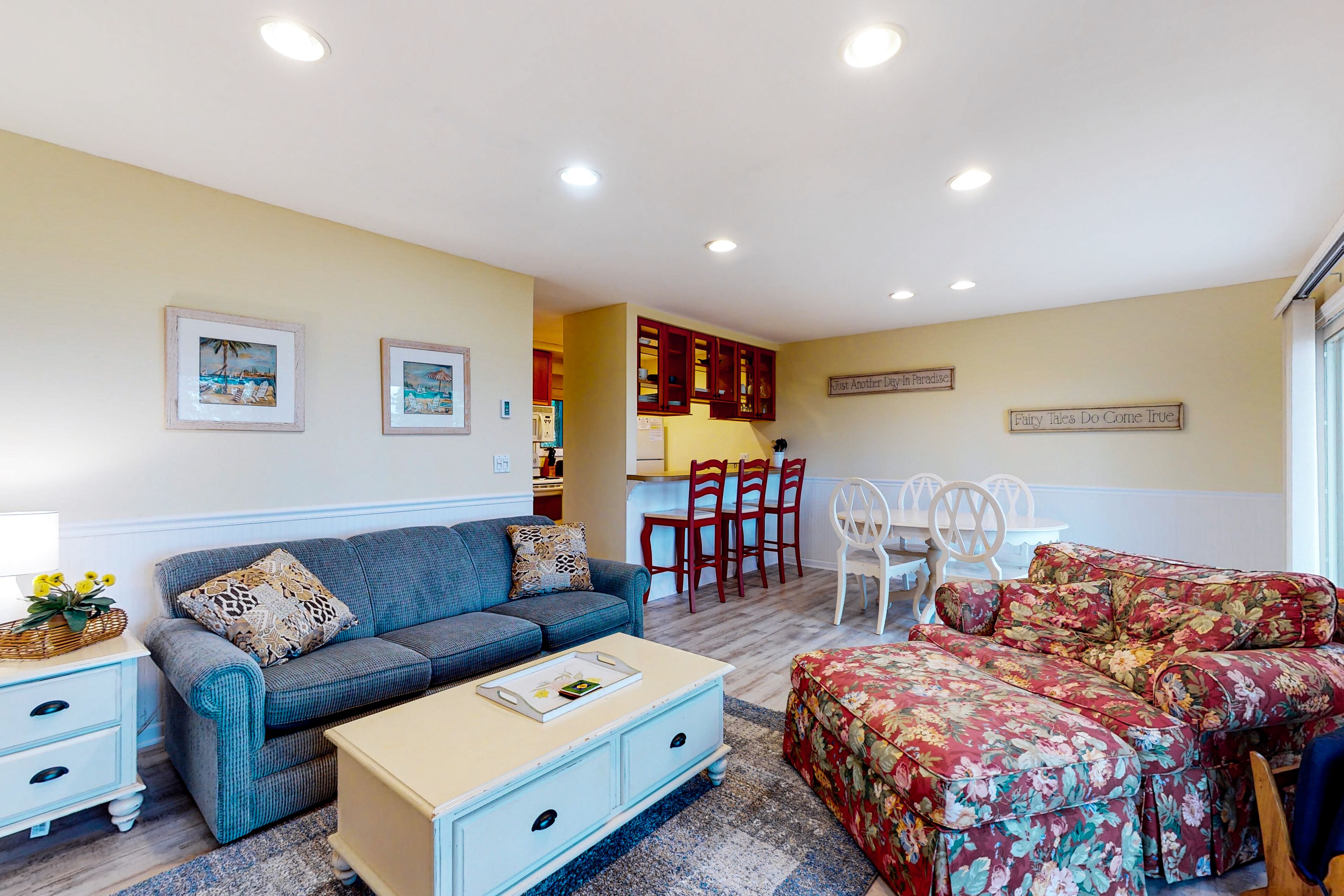 Riverfront condo with lake and river access, fireplace, firepit & gym