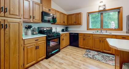 Downtown home with a firepit, deck, washer/dryer, fireplace - near the beach